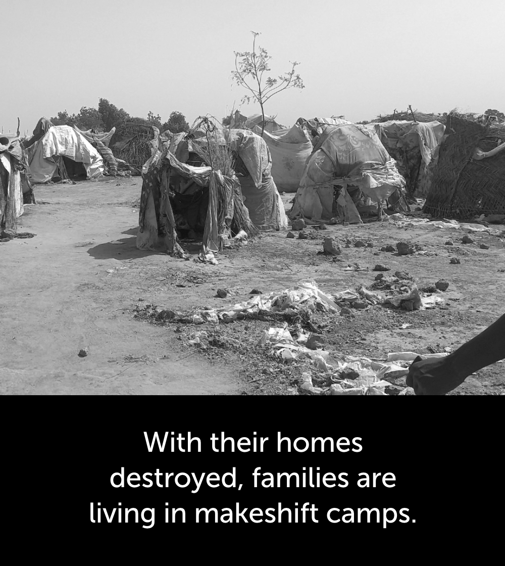 Makeshift tents made of plastic and sticks set up next to each other and caption that reads, 'With their homes destroyed, families are living in makeshift camps.'